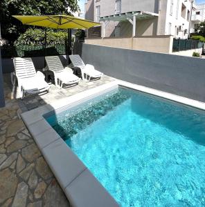 Sun n' Fun Apartments with Pool 