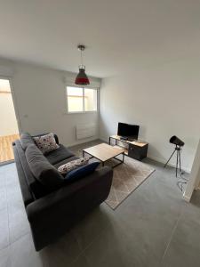 Appartements Appartement neuf avec patio : photos des chambres