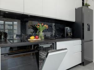 Apartment by Dziwna River with Spa & Pool