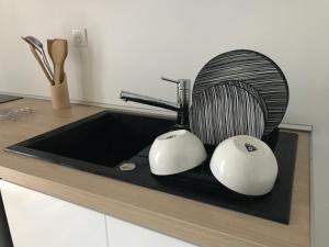 Appartements Au coeur de la ville : photos des chambres