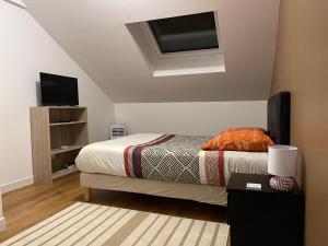 Maisons de vacances Gite de 2 chambres - Ancenis A11 - Logis du Chateau Rouge : photos des chambres