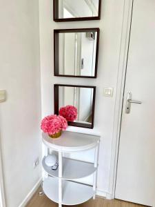 Appartements A 10min de Paris La Defense et Roland garros appartement lumineux avec parking et climatisation : photos des chambres