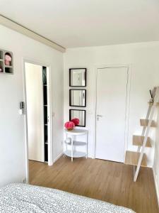 Appartements A 10min de Paris La Defense et Roland garros appartement lumineux avec parking et climatisation : photos des chambres