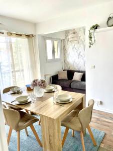 Appartements A 10min de Paris La Defense et Roland garros appartement tout confort avec parking et climatisation : photos des chambres