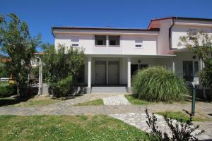 Ferienwohnung "Corinthia 3" direkt am Strand