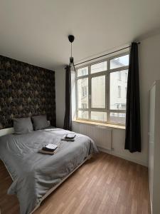 Appartements Le 12 T2 cosy wifi parking gratuit st Victor : photos des chambres