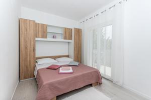 Two-Bedroom Apartment room in Apartments Luka