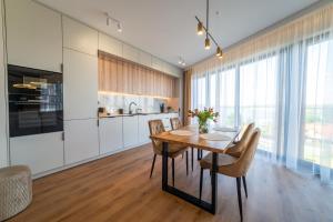 P R A T U M 17 Apartament z widokiem na jezioro