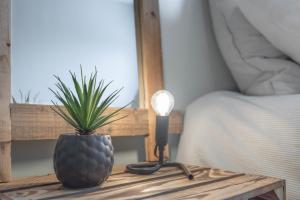 Appartements Suites Kerlarros Clim et Parking face Gare et Port : photos des chambres