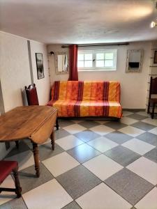 Maisons de vacances Charmant appart avec jardin : photos des chambres
