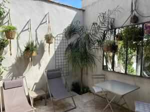 Appartements 3 etoiles terrasse ou patio intra-muros : photos des chambres