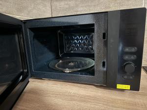 Laras voll ausgestattete Gartenwohnung mit WLAN und TV