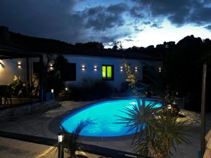 Appartements Partie de villa moderne avec acces piscine : photos des chambres