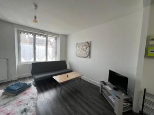 Appartements joli T1 avec parking gratuit : photos des chambres
