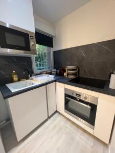 Appartement avec place de parking privé et jardin