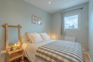 Appartements Suites Kerlarros Clim et Parking face Gare et Port : photos des chambres