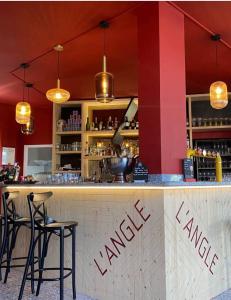 Appartements Suites Kerlarros Clim et Parking face Gare et Port : photos des chambres