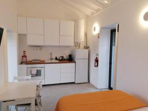 T0 com mezanino à beira-mar