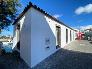 T0 com mezanino à beira-mar