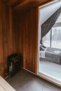 Sniegi design cabin with included sauna and jacuzzi
