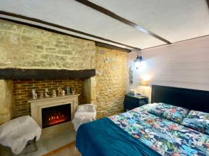B&B / Chambres d'hotes La Clef des Songes - chambres climatisees - Sarlat Centre - Parking gratuit - Piscine, Spa et massages a 400metres : photos des chambres