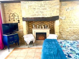 B&B / Chambres d'hotes La Clef des Songes - chambres climatisees - Sarlat Centre - Parking gratuit - Piscine, Spa et massages a 400metres : photos des chambres