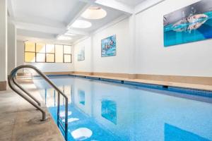 E-Appartement de luxe centre Gueliz piscine parking fibre netflix