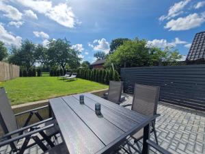 Ferienwohnung am See - Erdgeschoss - Ruhige Lage - Eigener Garten