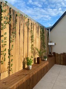 Appartements Maison de ville avec terrasse : photos des chambres
