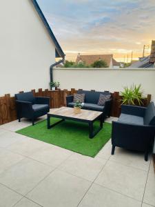 Appartements Maison de ville avec terrasse : photos des chambres