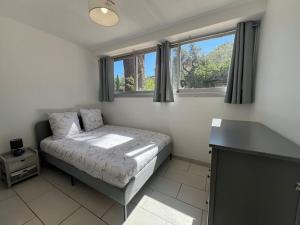 Appartements Au coeur des vacances : photos des chambres