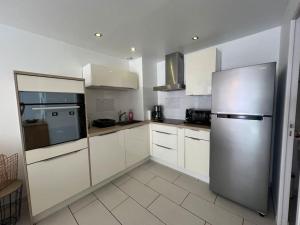 Appartements Au coeur des vacances : photos des chambres