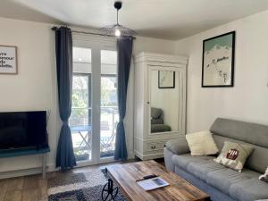 Appartements Bel Appartement dans residence cheminee /Jardin : photos des chambres