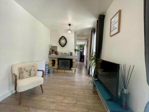 Appartements Bel Appartement dans residence cheminee /Jardin : photos des chambres