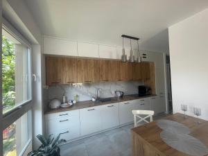 Apartamenty Kościuszki - faktury VAT - Klimatyzacja - Parking