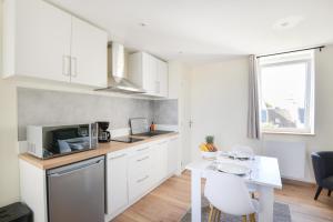 Appartements Le Haut de la Roseraie - Studio 3p avec vue mer : photos des chambres