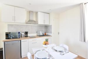 Appartements Le Haut de la Roseraie - Studio 3p avec vue mer : photos des chambres