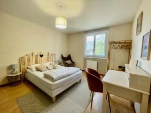 Appartements Bel Appartement dans residence cheminee /Jardin : photos des chambres