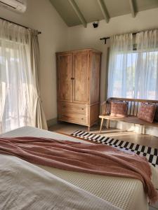 SaffronStays Belle Maison - 3BR French style luxury villa with pool, bougainvillae views & alfresco dining near Kihim Beach