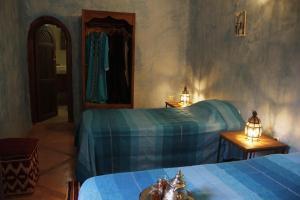 Deluxe Triple Room room in Riad Azenzer