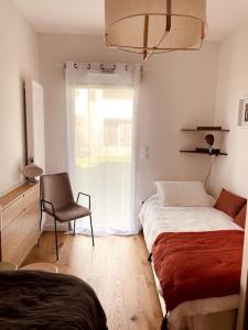 Appartements Le Berlioz - Jardin privatif : photos des chambres