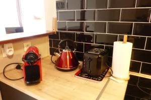 Appartements le nid cosy : photos des chambres