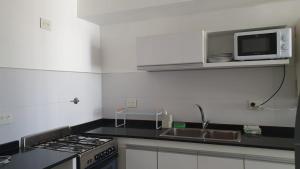 APA Madryn Allegra - céntrico, balcón con vista a la ciudad