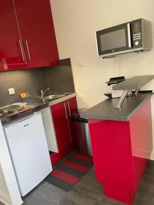 Appartements La Fregate -studio lumineux et verdoyant : photos des chambres