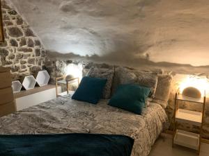 Appartements Dans le charme de la pierre : photos des chambres