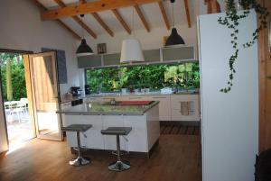 Villas Grande maison bois entre ocean et lac : photos des chambres