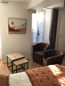 Appartements le nid cosy : photos des chambres