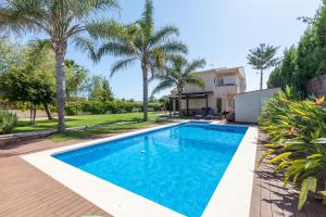 Casa junto al mar con jardín