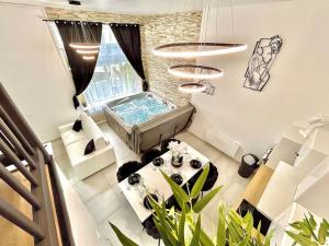 Appartements loft des desirs hammam, jacuzzi : photos des chambres