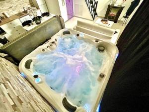 Appartements loft des desirs hammam, jacuzzi : photos des chambres